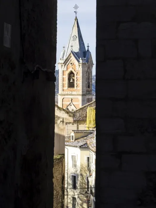Framed Print : Sight of the Tower of the church of the Salvador in Cuenca, from inside an alley Framed Print : Sight of the Tower of the church of the Salvador in Cuenca, from inside an alley