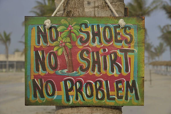 Sign No shoes, no shirt, no problem on the beach of Salalah Rotana Resort, Salalah, Dhofar Region, Oman