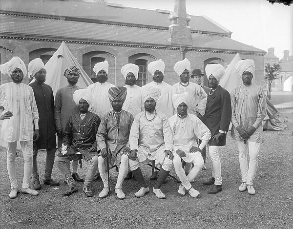 Sikh Men. circa 1900: A group of Sikh men wearing their national dress