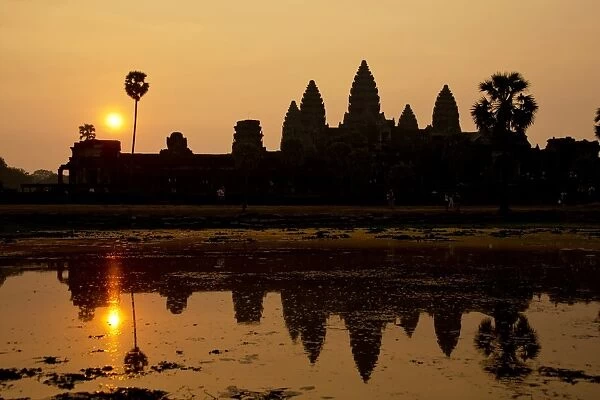 Silhouette Angkor Wat Against Sky During Sunset
