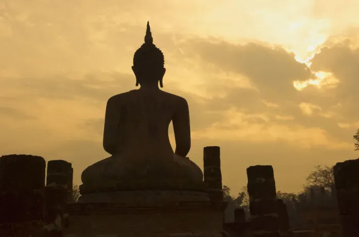 Framed Print : Silhouette of buddha statue at sunset, Thailand Framed Print : Silhouette of buddha statue at sunset, Thailand