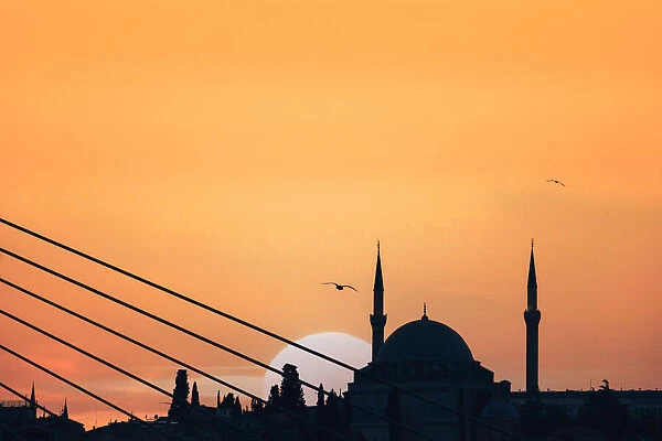 silhouette of Mosque and bridge at sunset, Istanbul, Turkey