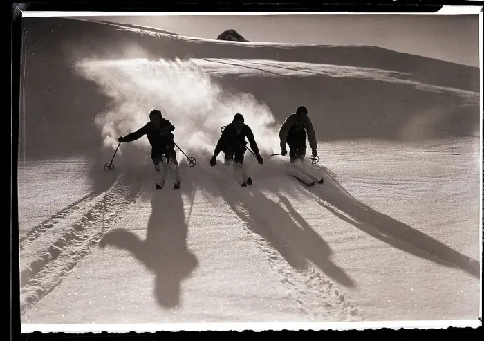 Framed Print : Three Silhouetted Skiers Descend Slope Framed Print : Three Silhouetted Skiers Descend Slope