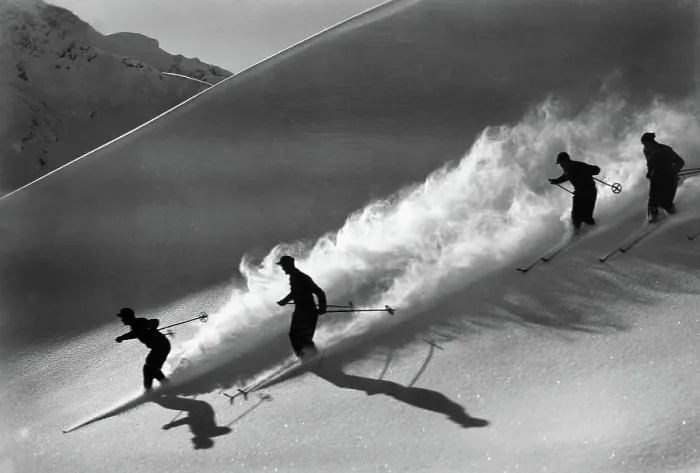 Framed Print : Silhouetted Skiers Desending Slope Framed Print : Silhouetted Skiers Desending Slope