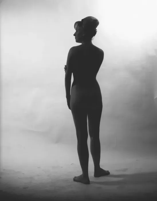 Framed Print : Silhuette of nude woman posing in studio, (Rear view), (B&W) Framed Print : Silhuette of nude woman posing in studio, (Rear view), (B&W)