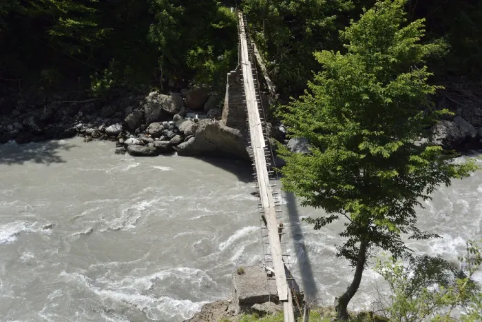 Framed Print : Simple suspension bridge over the Enguri river, Svaneti or Svanetia, Caucasus Mountains, Georgia Framed Print : Simple suspension bridge over the Enguri river, Svaneti or Svanetia, Caucasus Mountains, Georgia