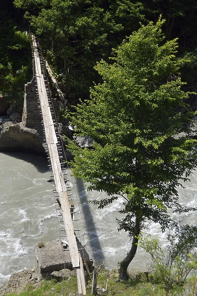 Simple suspension bridge over the Enguri river, Svaneti or Svanetia, Caucasus Mountains, Georgia