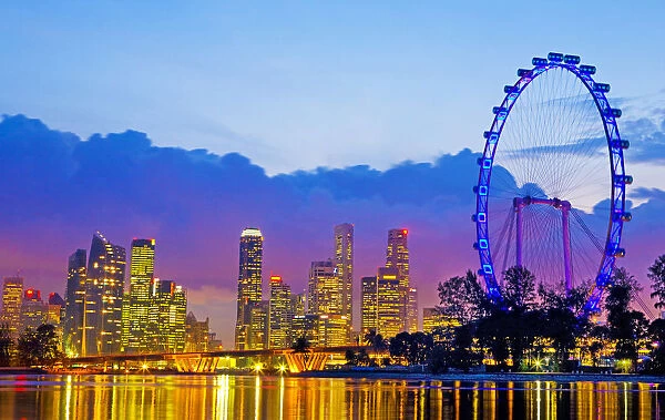 Singapore skyline and the Singapore Flyer at dusk