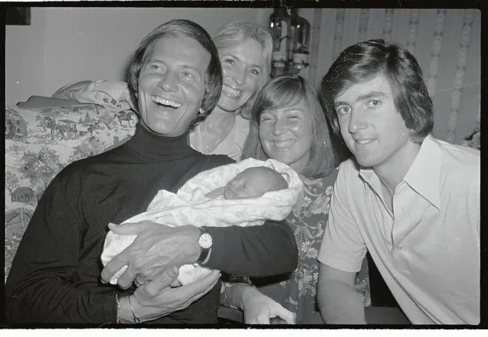 Framed Print : Singer Pat Boone Holding Grandson Framed Print : Singer Pat Boone Holding Grandson