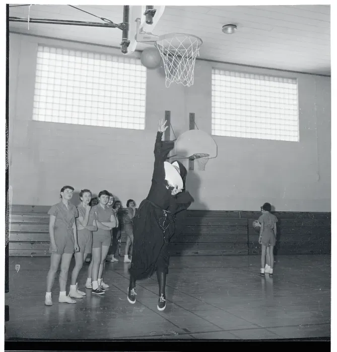 Framed Print : Sister Lawrence Playing Basketball Framed Print : Sister Lawrence Playing Basketball