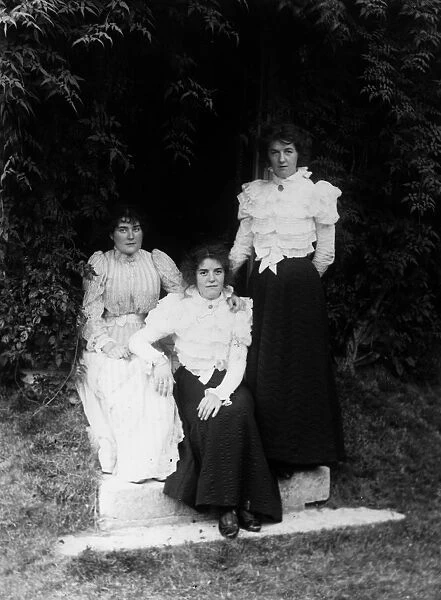 Sisters. circa 1900: Three sisters in their garden. (Photo by F J Mortimer / Getty Images)