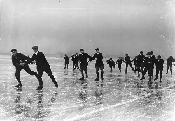 Skating. January 1908: Skating arm in arm on Cowbit Wash, Spalding, Lincolnshire