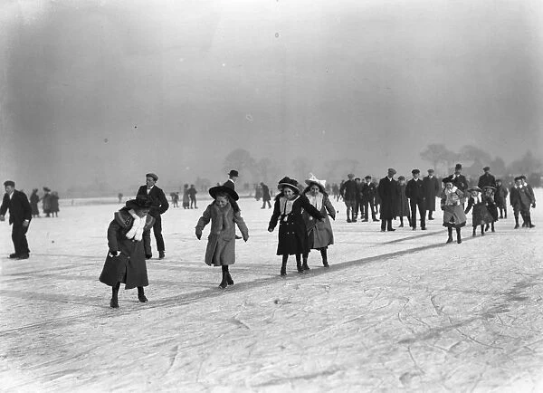 Skating. January 1908: A group out skating on Cowbit Wash in Lincolnshire