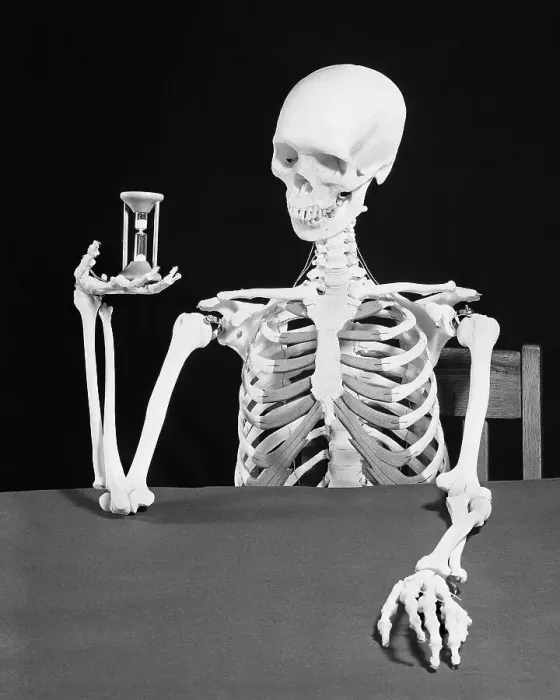 Framed Print : Skeleton Holding Hourglass Framed Print : Skeleton Holding Hourglass