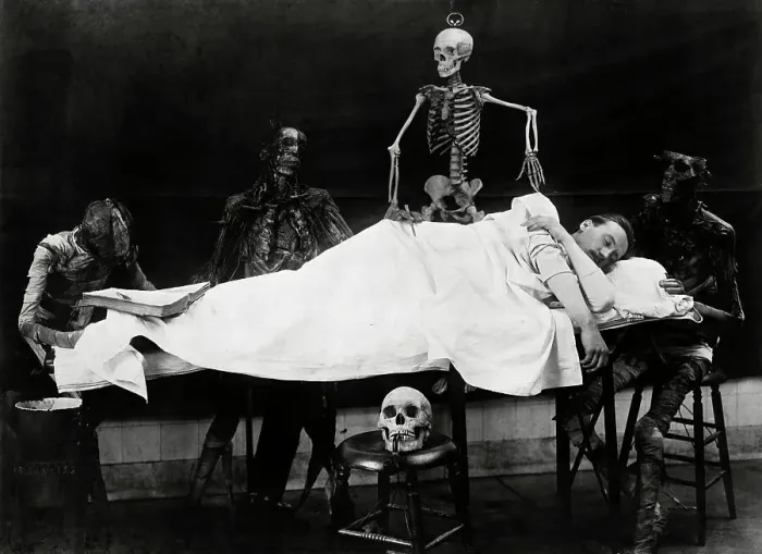 Framed Print : Skeletons Surrounding Sleeping Man Framed Print : Skeletons Surrounding Sleeping Man