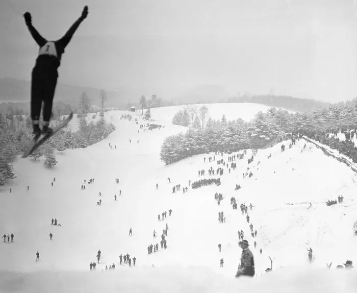 Framed Print : Ski Jumper Soaring in the Air