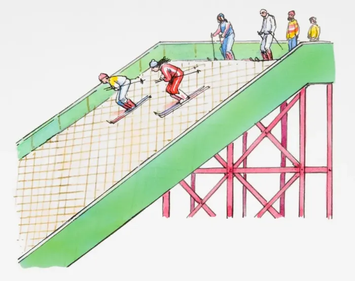 Framed Print : Skiers descending down artificial slope