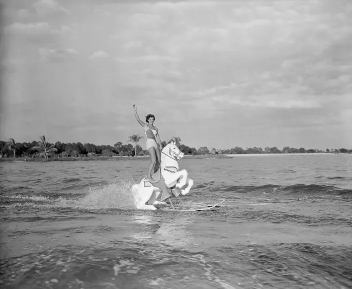 Framed Print : Skilled Female Water Skier Performing on the Water Framed Print : Skilled Female Water Skier Performing on the Water