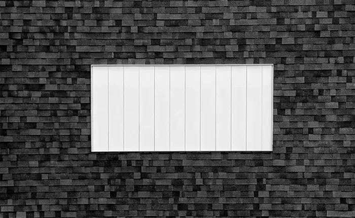 Framed Print : Skylight. A black and white photograph of a skylight on the tiled roof Framed Print : Skylight. A black and white photograph of a skylight on the tiled roof