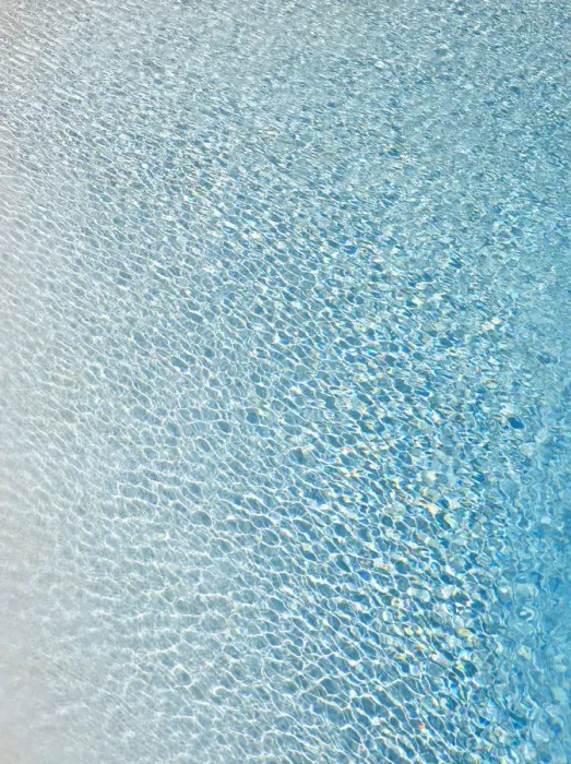 Framed Print : Slightly ruffled turquoise-coloured surface of water in a swimming pool Framed Print : Slightly ruffled turquoise-coloured surface of water in a swimming pool