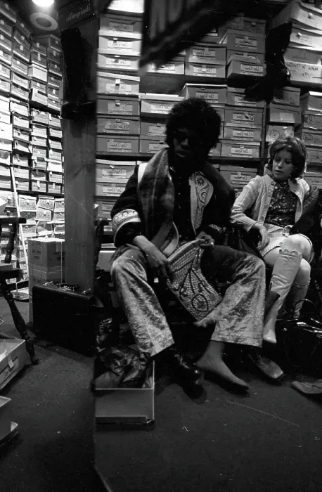 Framed Print : Sly Stone Tries On Boots Framed Print : Sly Stone Tries On Boots