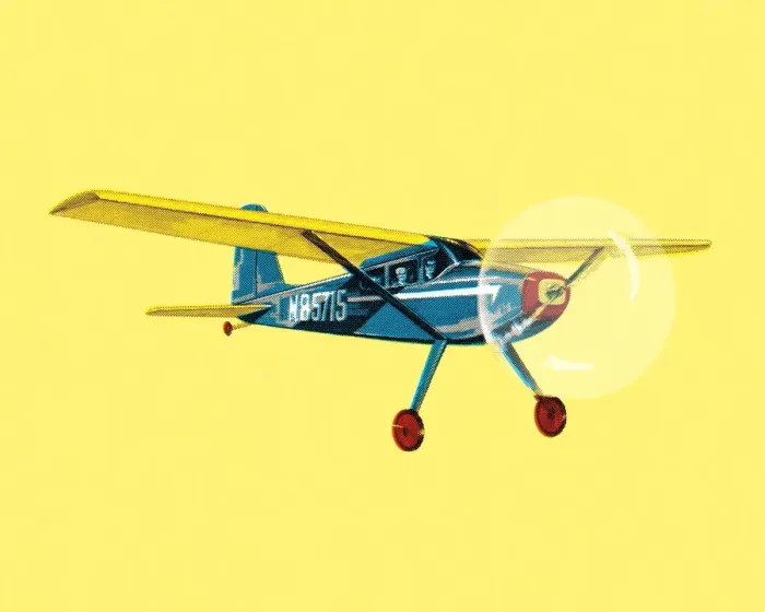 Framed Print : Small Airplane on a Yellow Background Framed Print : Small Airplane on a Yellow Background