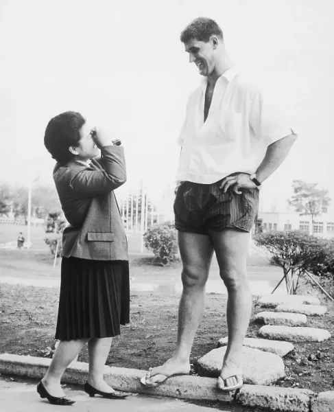 Small Girl Photographing Tall Man Print, Tokyo 1964. Art Prints