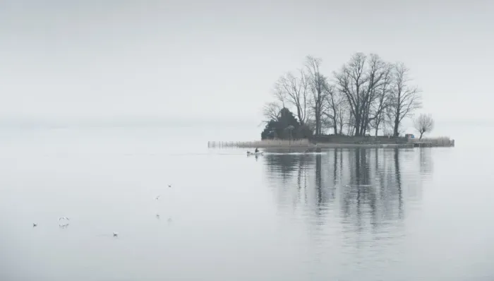 Framed Print : a small island in lake Zurich on a cloudy day Framed Print : a small island in lake Zurich on a cloudy day