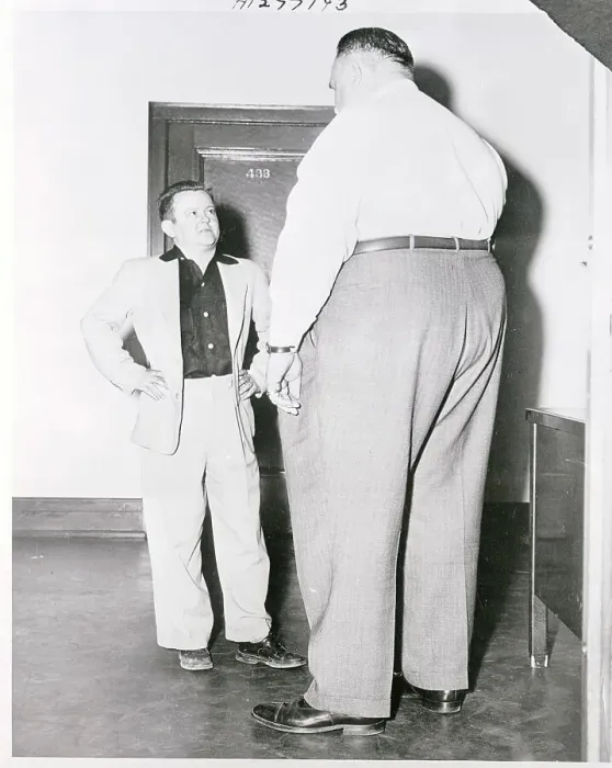 Framed Print : Small and Large Men Framed Print : Small and Large Men