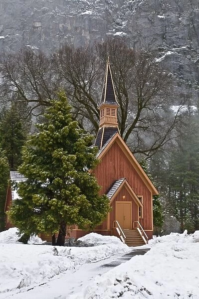 Small wooden church in winter