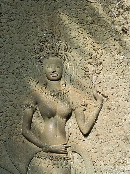 Only one smilely apsara sculpture from 1800+ apsara at Angkor wat, siem reap, cambodia