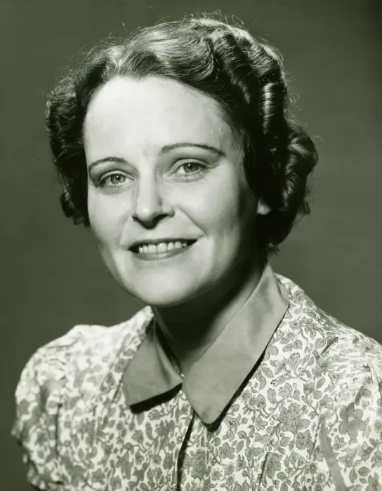 Framed Print : Smiling mature woman posing in studio, (B&W), portrait, close-up Framed Print : Smiling mature woman posing in studio, (B&W), portrait, close-up