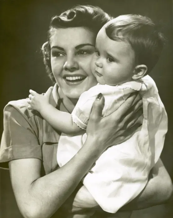 Framed Print : Smiling mother with baby