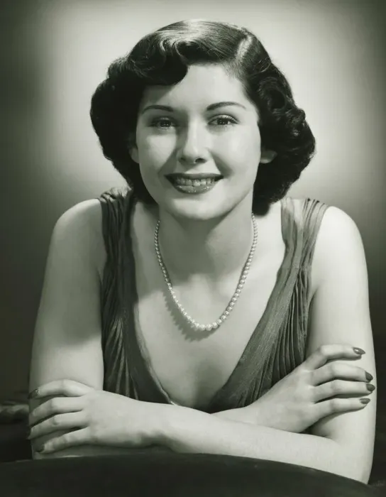 Framed Print : Smiling woman posing in studio, (B&W), (Close-up), (Portrait) Framed Print : Smiling woman posing in studio, (B&W), (Close-up), (Portrait)