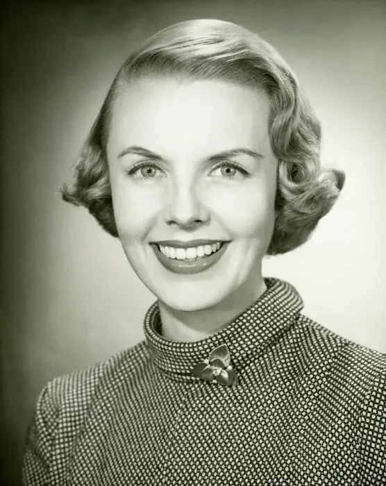 Framed Print : Smiling woman posing in studio, (B&W), portrait, close-up Framed Print : Smiling woman posing in studio, (B&W), portrait, close-up