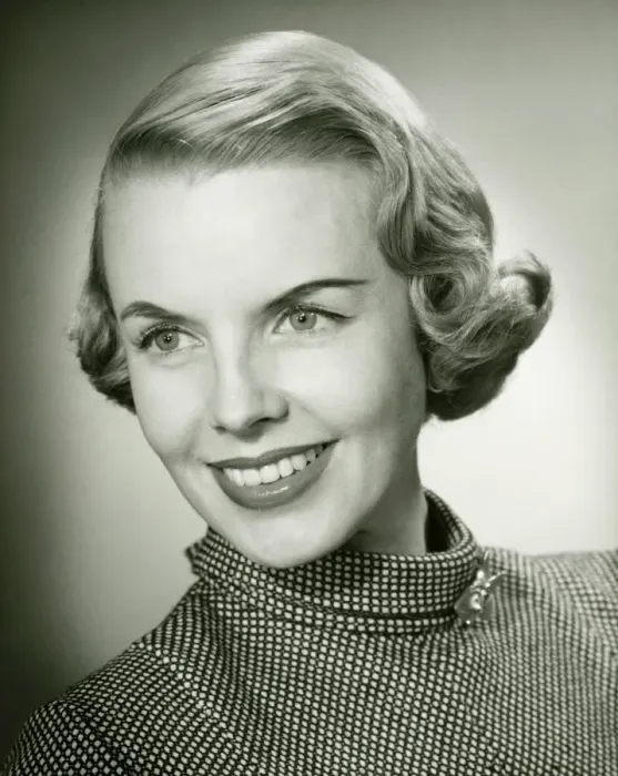Framed Print : Smiling woman posing in studio, (B&W), portrait, close-up Framed Print : Smiling woman posing in studio, (B&W), portrait, close-up