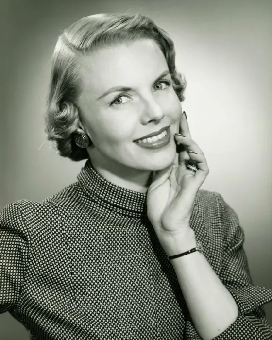 Framed Print : Smiling woman posing in studio, (B&W), portrait Framed Print : Smiling woman posing in studio, (B&W), portrait