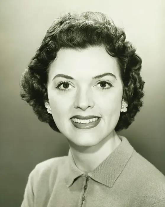 Framed Print : Smiling woman in studio, (B&W), close-up, portrait Framed Print : Smiling woman in studio, (B&W), close-up, portrait
