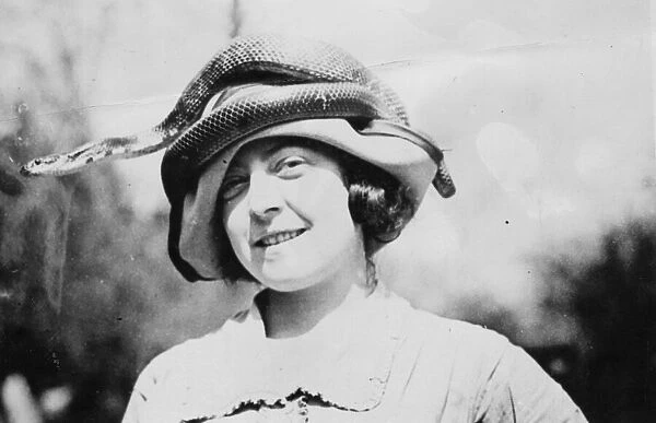 Snake Hat. circa 1930: Miss Evine Doty, of the Reptile Study Society