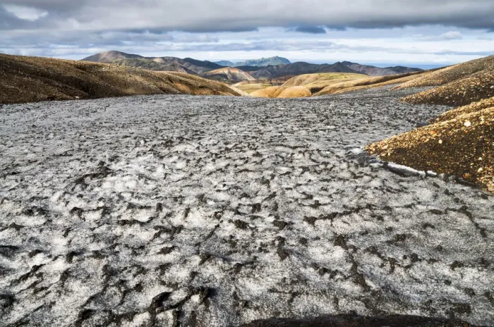 Framed Print : Snow field colored black from ashes, rhyolite mountains, Landmannalaugar, Fjallabak Nature Reserve, Highlands of Iceland, Iceland, Europe Framed Print : Snow field colored black from ashes, rhyolite mountains, Landmannalaugar, Fjallabak Nature Reserve, Highlands of Iceland, Iceland, Europe