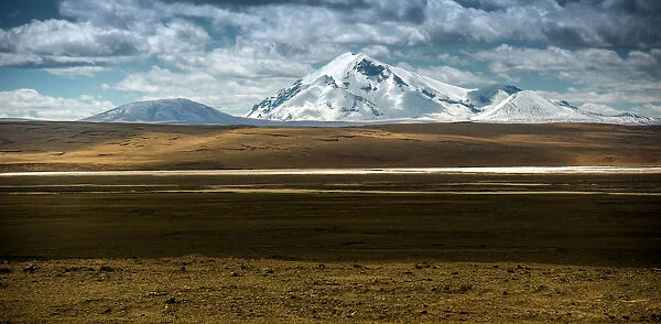 Snow mountain over Tibetan plateau