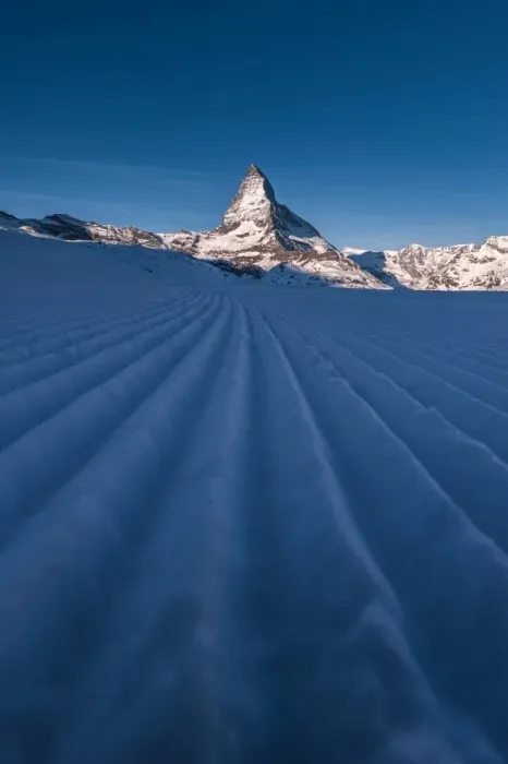 Framed Print : Snow ski track pattern with Matterhorn background Framed Print : Snow ski track pattern with Matterhorn background