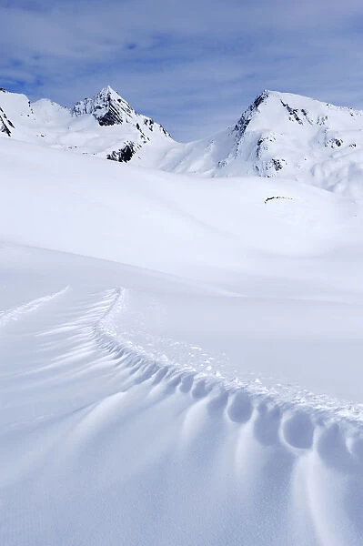 Snowdrift on the panoramic hiking trail of Sennhuette-Schnydi, Leukerbad, Valais, Switzerland, Europe