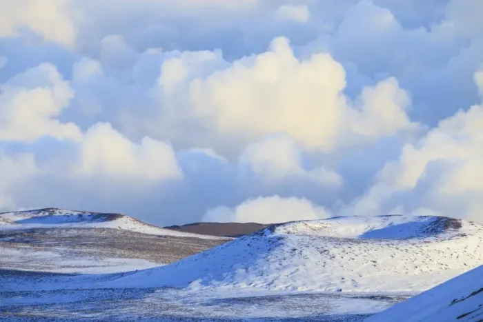 Framed Print : Snowy hilltops and clouds