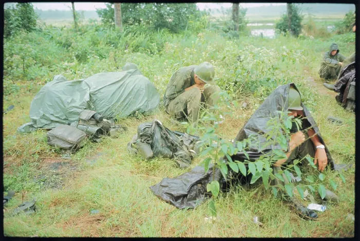 Framed Print : Soaked US Soldiers Taking Break Framed Print : Soaked US Soldiers Taking Break