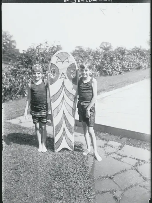Framed Print : Socialite Children Posing with Their Surf Board Framed Print : Socialite Children Posing with Their Surf Board