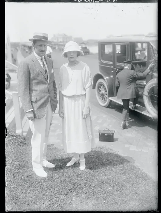 Framed Print : Socialite Couple near Chauffeured Car Framed Print : Socialite Couple near Chauffeured Car