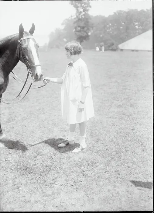 Framed Print : Socialite Holding Her Horse's Bridle Framed Print : Socialite Holding Her Horse's Bridle