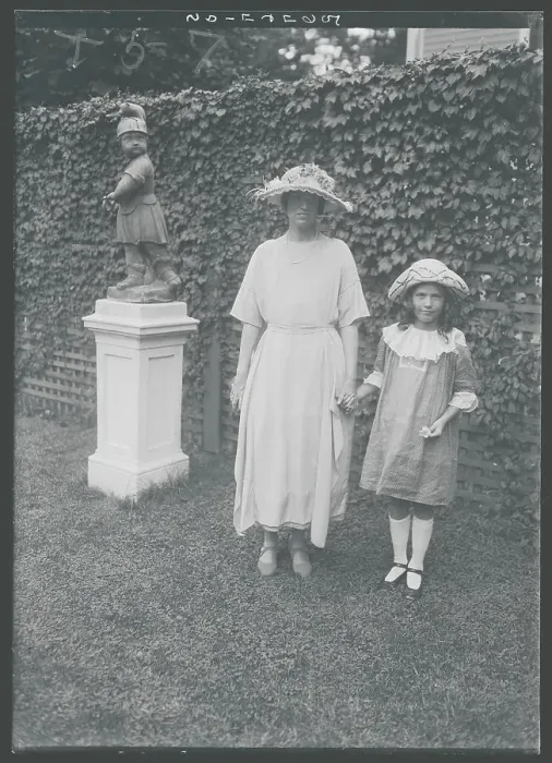Framed Print : Socialite Posing with Young Girl Framed Print : Socialite Posing with Young Girl