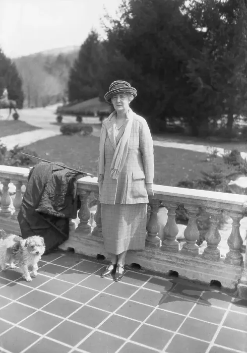 Framed Print : Socialite Woman Posing with Dog on Balcony Framed Print : Socialite Woman Posing with Dog on Balcony
